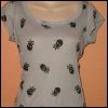 Gray skull and crossbones tank top