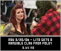 Lita gets the Mandible Claw from Mick Foley