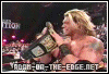 Edge and Lita celebrate with the WWE title