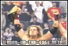 Edge celebrates with the World title