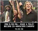 Edge, Lita and Mick enjoy the hardcore championship