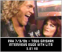 Edge and Lita backstage with Todd Grisham
