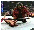 Lita gets the Mandible Claw from Foley