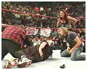 Edge, Lita and Foley taking out Terry Funk